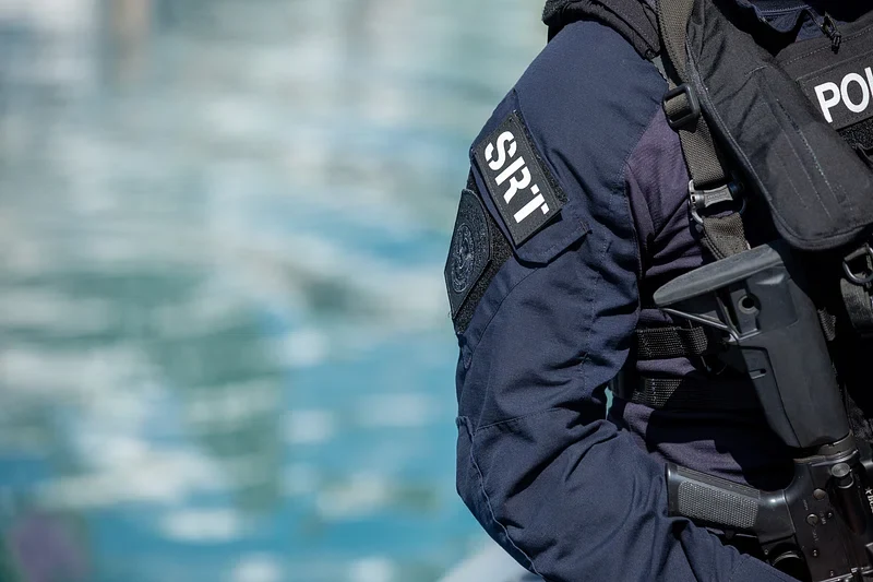 Archived illustration of a uniformed person wearing a vest