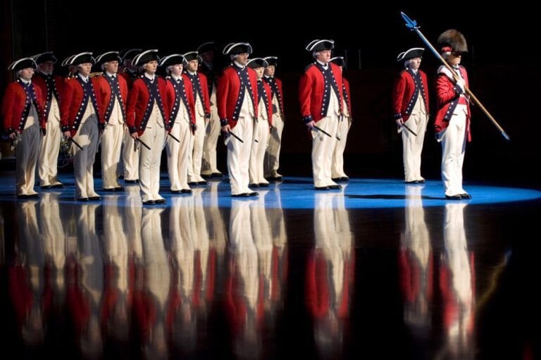 group-of-men-in-red-and-white-uniforms
